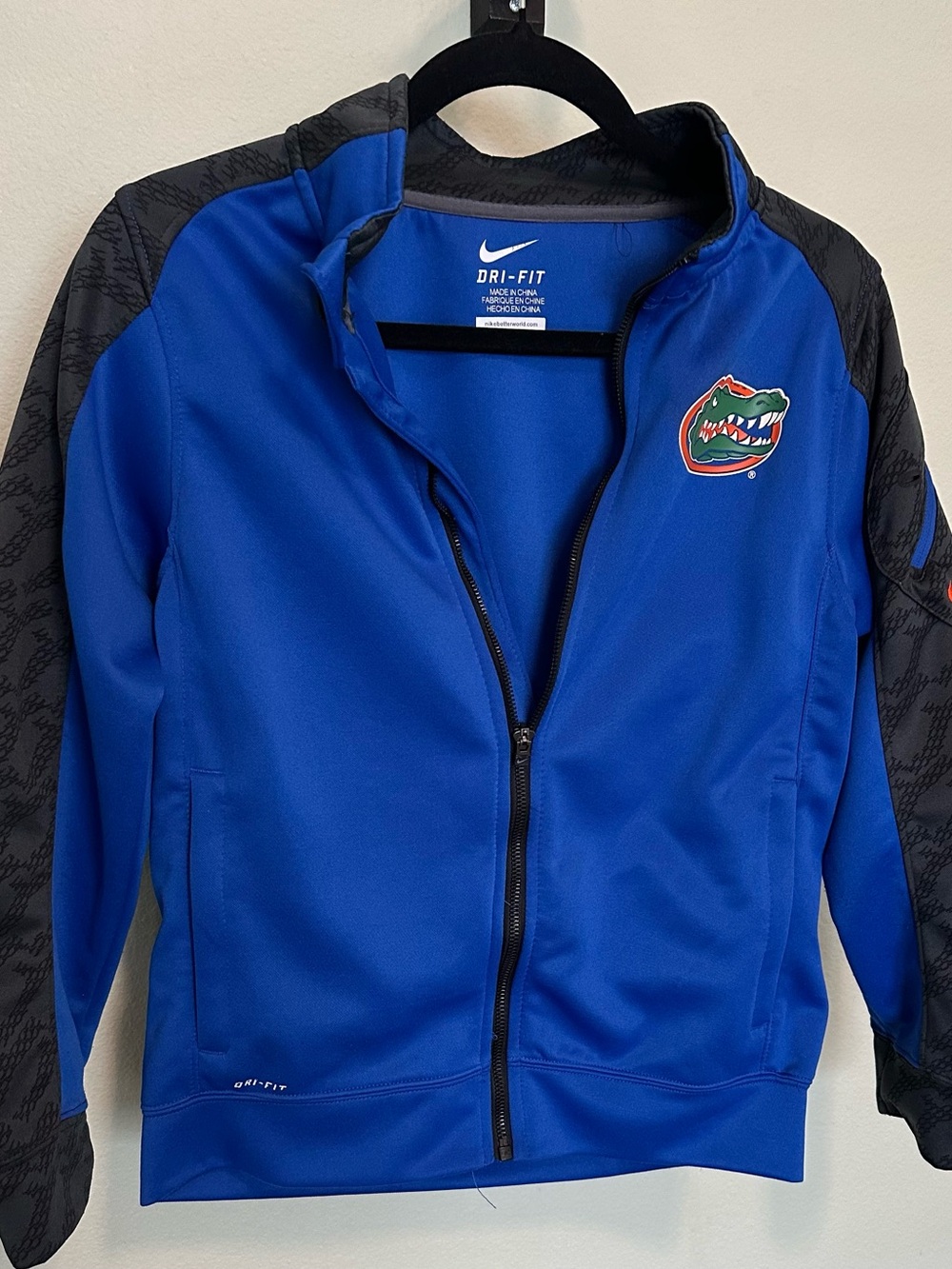 Nike Kids Blue Full-Zip Dri-FIT Jacket with Black Sleeves and Team Patch